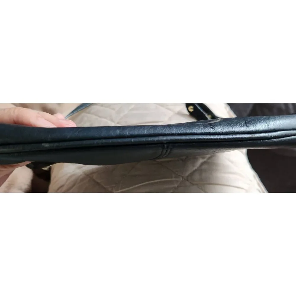 Coach Ashley large black leather wristlet. Approx 9.5 wide, 5.5 high